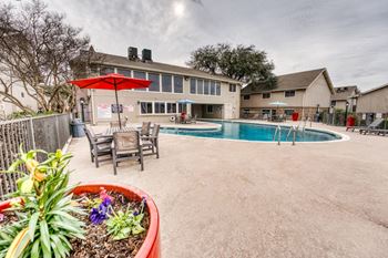 Our apartments have a large pool and patio